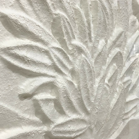 Textured wall art with raised botanical paper relief