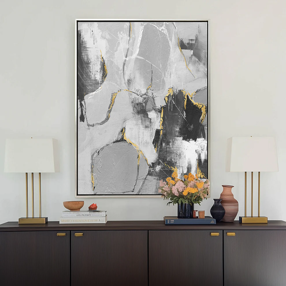 neutral abstract oil painting wall art decor in modern living room setting with lamps and flowers