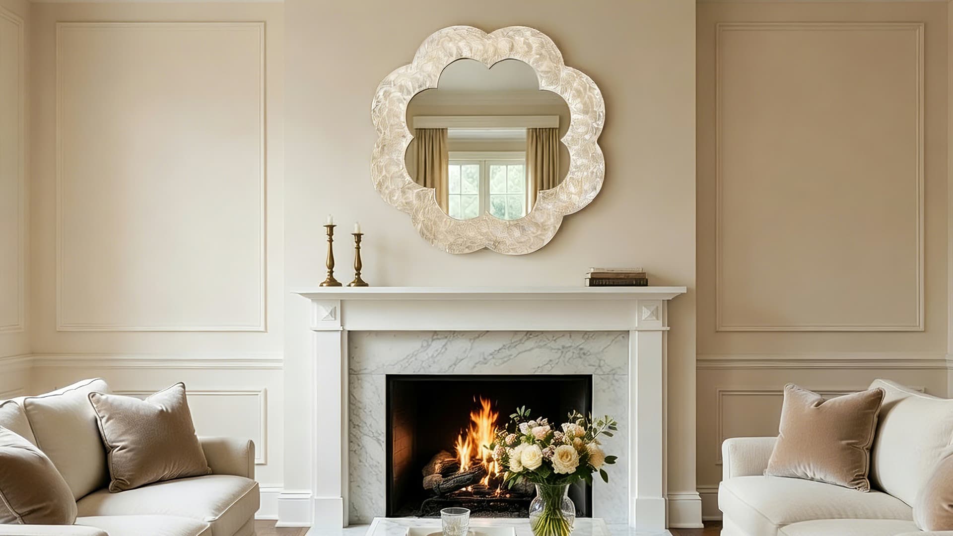 Organic sculptural flower-shaped mirror above the fireplace in the living room.