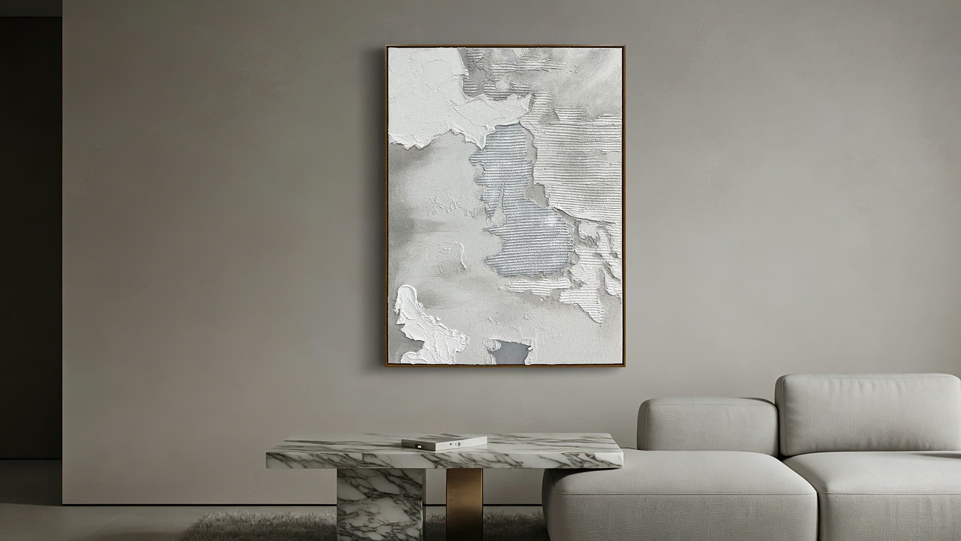 Abstract sandstone-textured wall art in the neutral modern living room.
