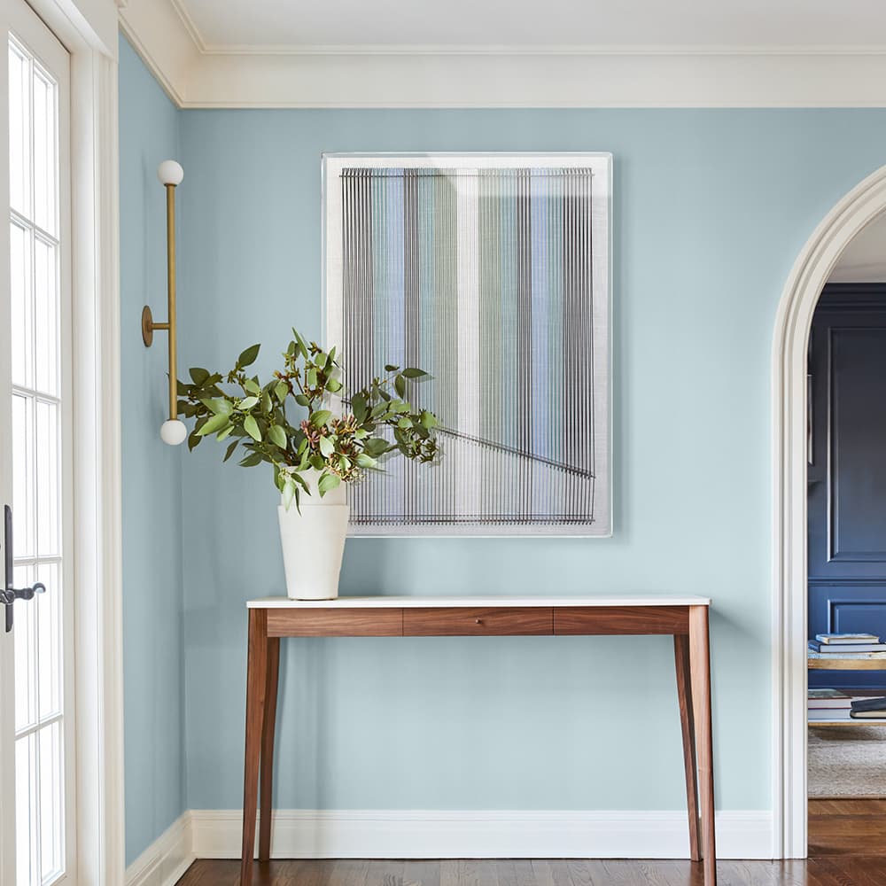 Handcrafted jade thread geometric wall art creating subtle optical depth and movement