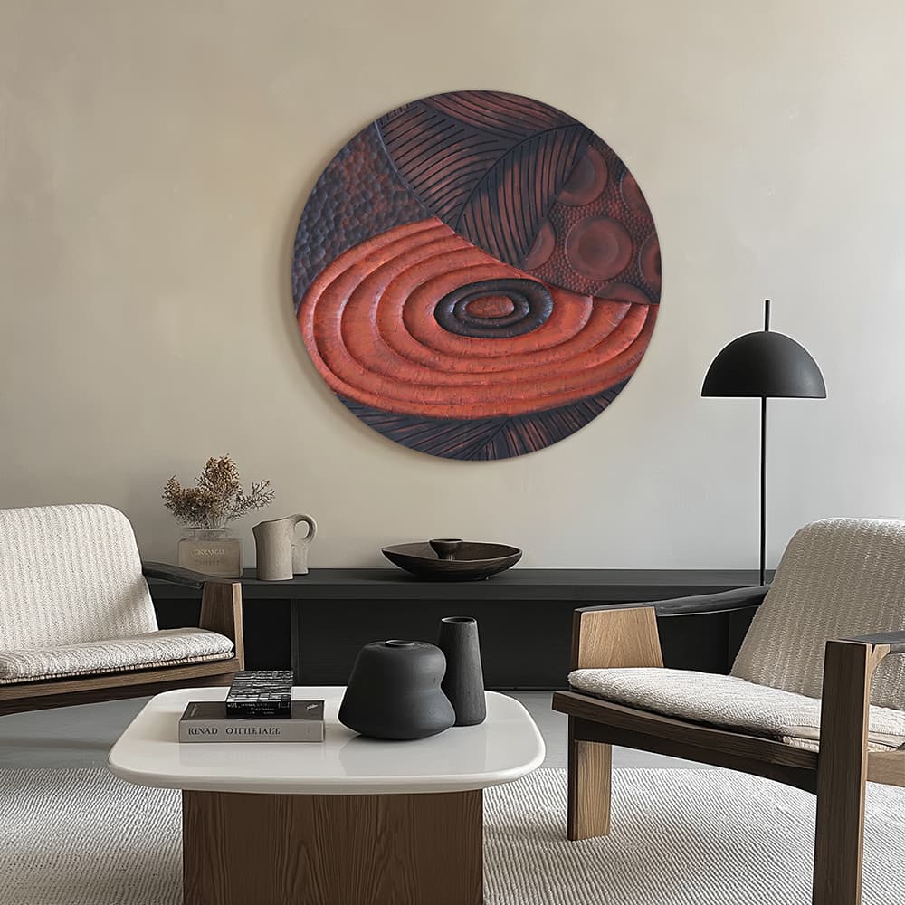 Modern abstract wall art featuring a circular relief design with layered engraved patterns