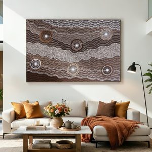 Large aboriginal dot wall art in bright modern living room.